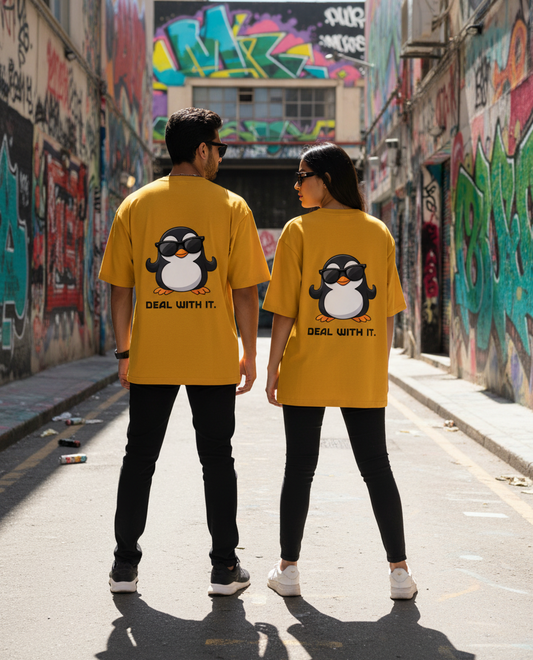 Models wearing yellow coloured t-shirt with Deal With It Penguin graphic on an oversized tee