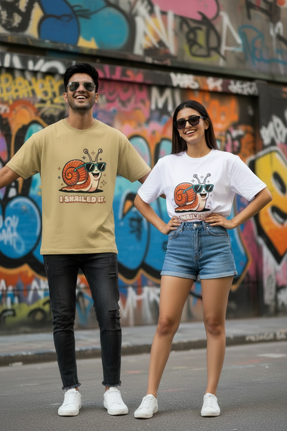 Two models wearing a humorous graphic classic t-shirt stating I Snailed It