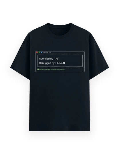 Navy classic t-shirt with a dev joke stating code was authored by AI, debugged by also AI