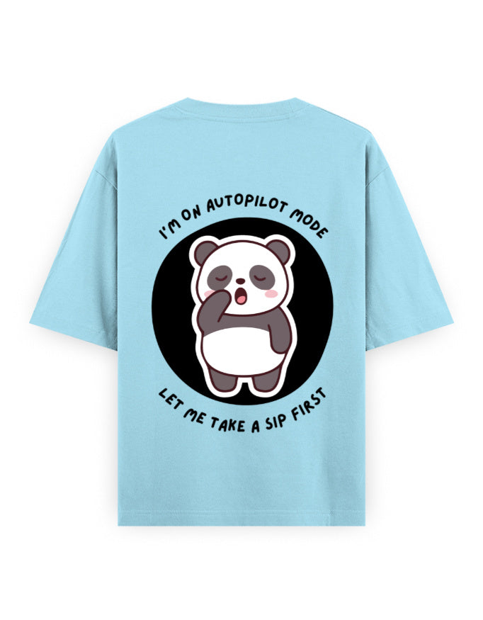 Light blue oversized t-shirt with panda graphic with a quote - I’m on autopilot mode, let me take a sip first