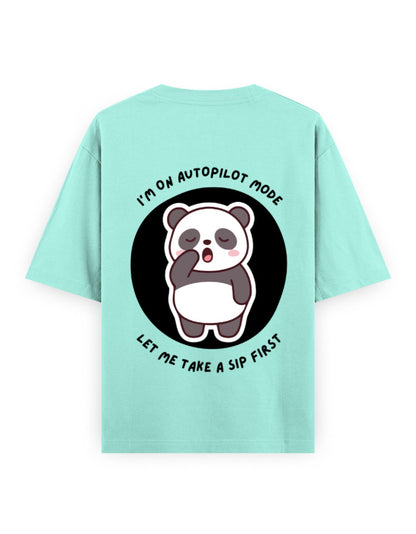 Mint color oversized t-shirt with panda graphic with a quote - I’m on autopilot mode, let me take a sip first