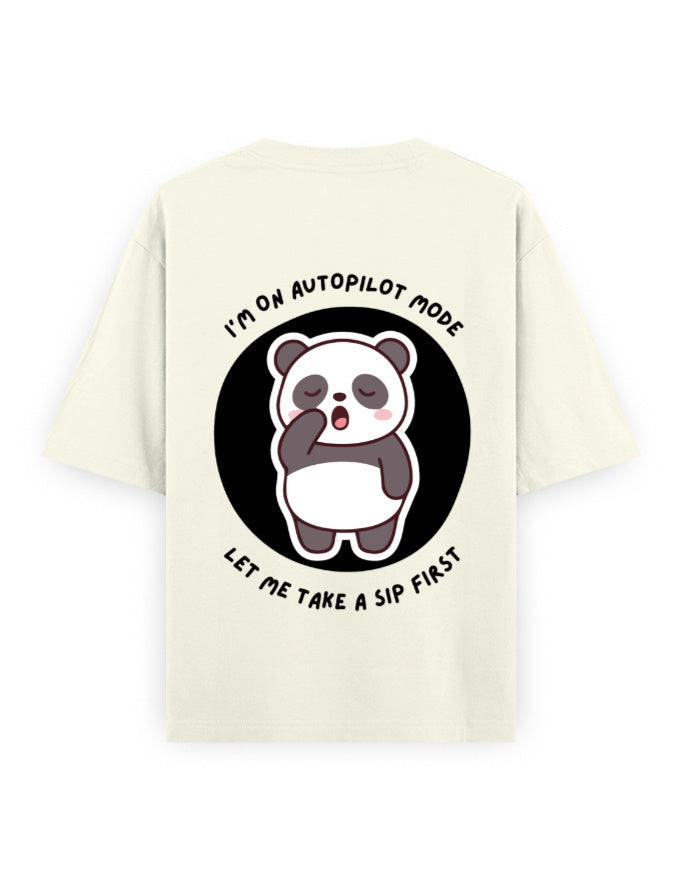 Off white oversized t-shirt with panda graphic with a quote - I’m on autopilot mode, let me take a sip first