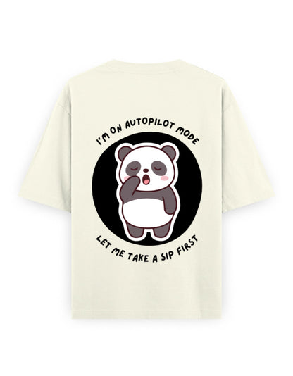 Off white oversized t-shirt with panda graphic with a quote - I’m on autopilot mode, let me take a sip first