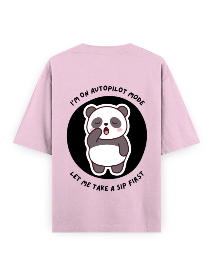 Pink oversized t-shirt with panda graphic with a quote - I’m on autopilot mode, let me take a sip first