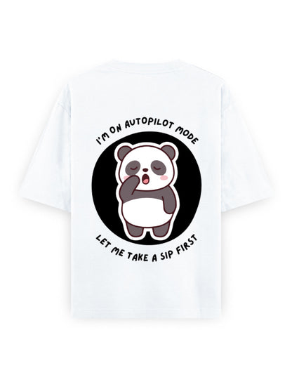 White oversized t-shirt with panda graphic with a quote - I’m on autopilot mode, let me take a sip first