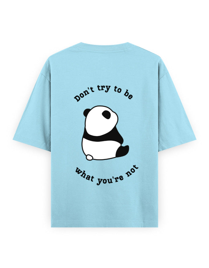 Light blue oversized t-shirt with panda graphic and quote stating Don’t try to be what you’re not