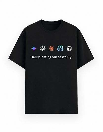 A black short-sleeve crewneck t-shirt with a graphic on the chest featuring five AI-themed icons of Gemini OpenAI Claude Copilot and Cursor above the white text 'Hallucinating Successfully.' on a clean white background.