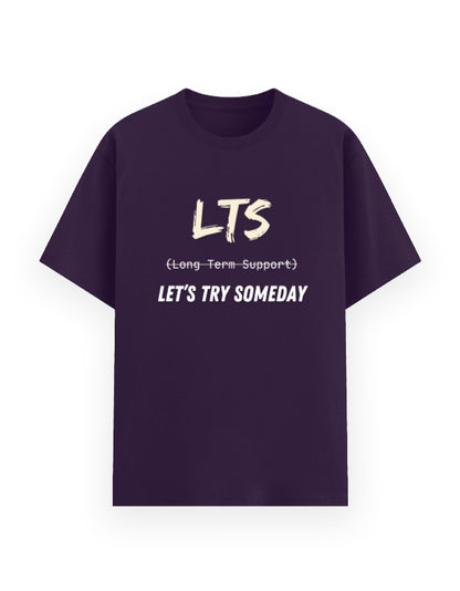 Purple t-shirt with humorous dev joke stating LTS being Let's Try Someday and not Long-Term Support