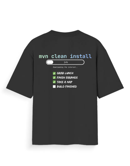 Black oversized tee shirt with a dev joke around time taken by mvn clean install