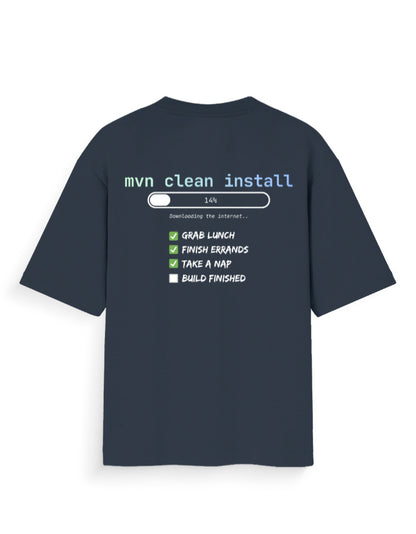 Navy blue oversized tee shirt with a dev joke around time taken by mvn clean install