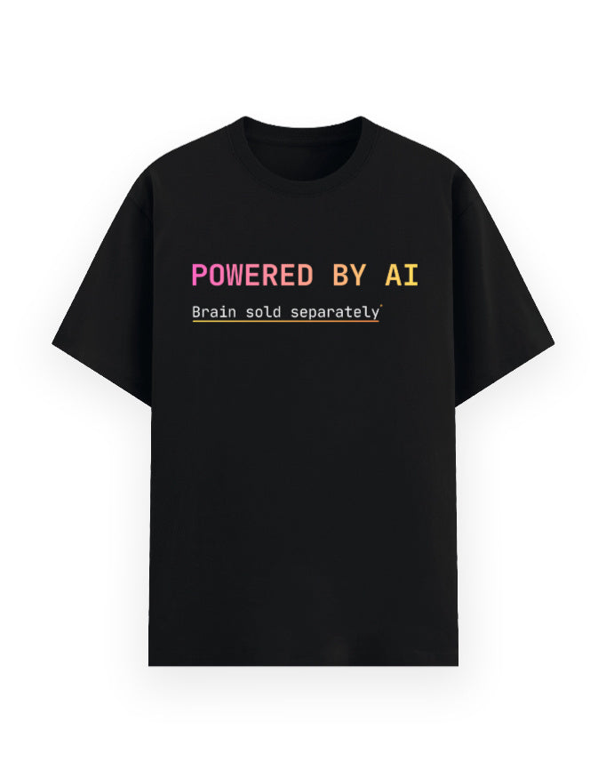 Black classic t-shirt with a dev joke stating developer is powered by ai, their brain is sold separately