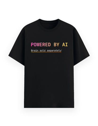 Black classic t-shirt with a dev joke stating developer is powered by ai, their brain is sold separately