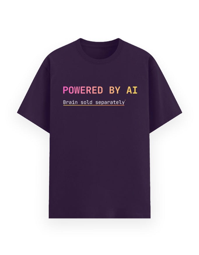 Purple classic t-shirt with a dev joke stating developer is powered by ai, their brain is sold separately