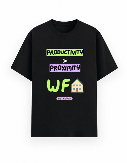 A black short-sleeve unisex t-shirt with a colorful graphic print on the front. The graphic features the text 'PRODUCTIVITY > PROXIMITY' in green and purple blocks, followed by 'WFH' in large green letters and a small house emoji, with 'since 2020' written below on a purple banner.